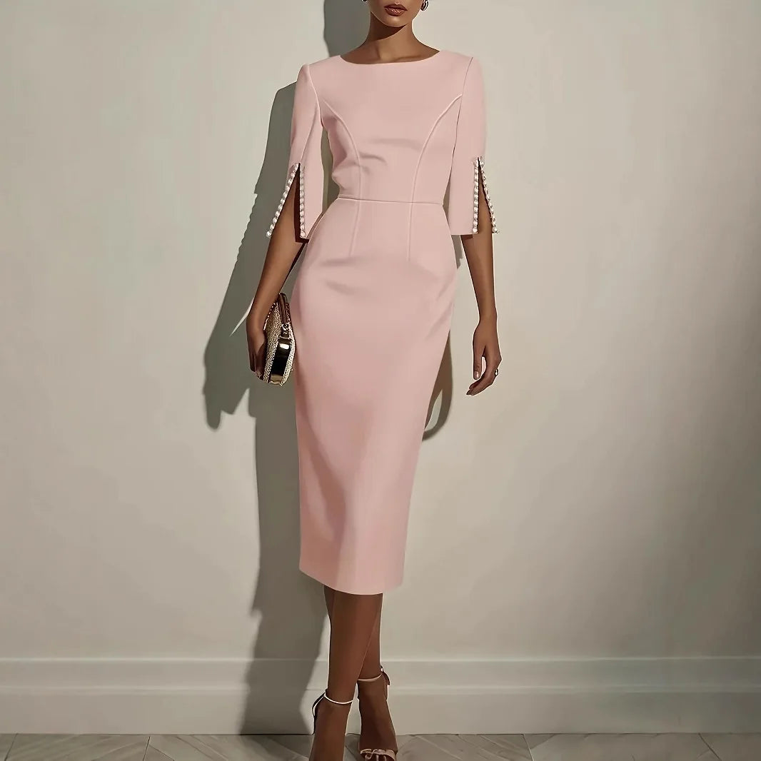 Nerina | VESTIDO ELEGANTE CON MANGAS ABIERTAS DECORADAS CON PERLAS