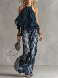 Ludovica - elegante in chiffon con top a collo alto e pantaloni larghi stampati